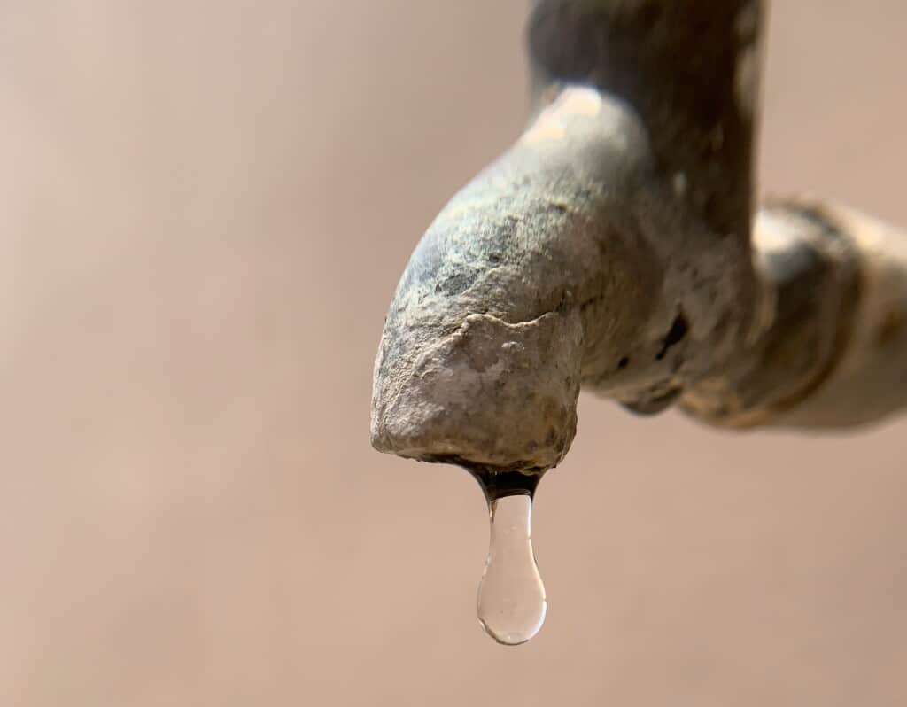 6 Signs You Need a Water Softener: Industrial and Commercial Guide 1 Mineral scale build upon a pipe