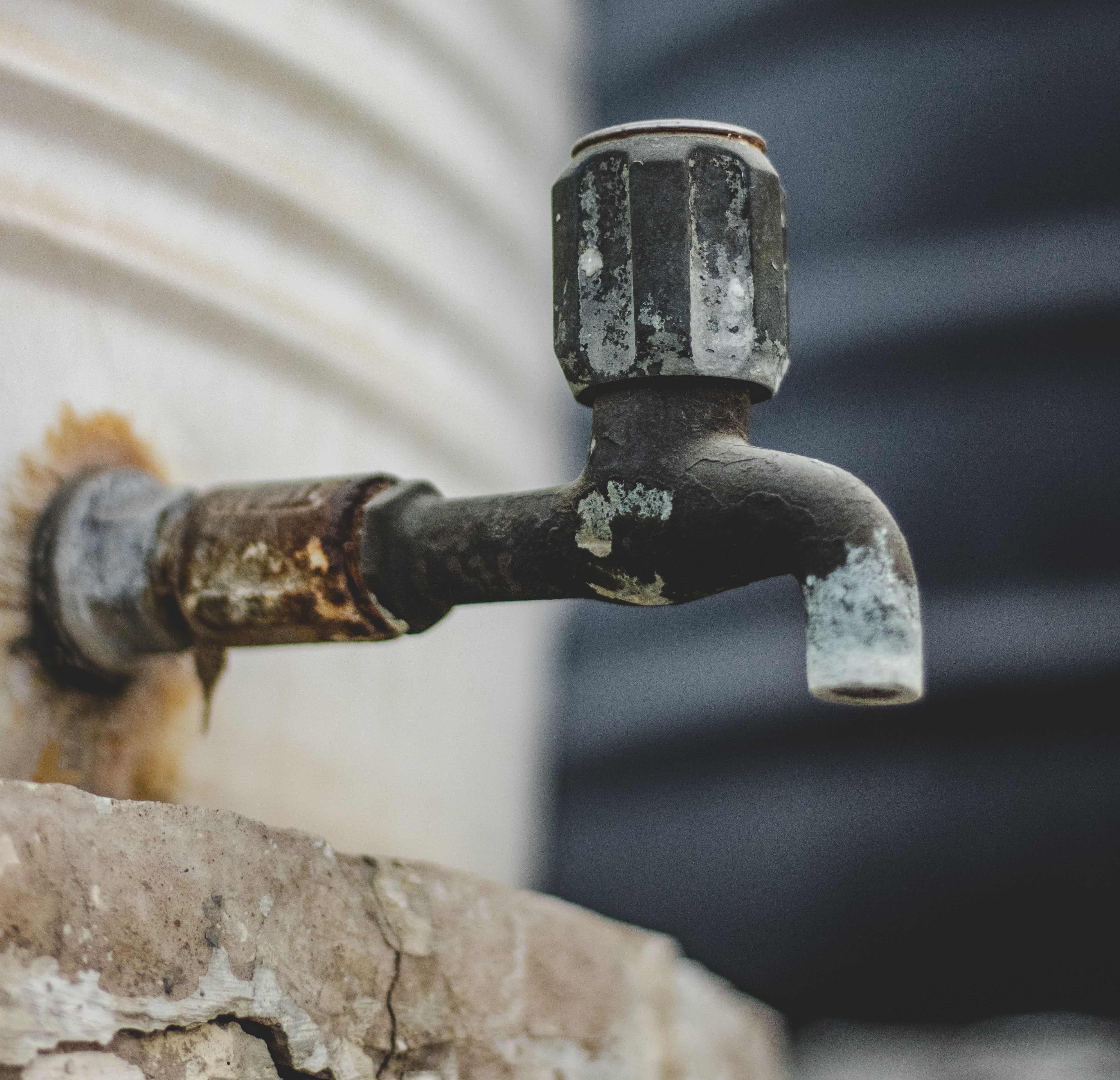 Guide to Detecting and Preventing Scale Buildup in Commercial Settings 1 Scale buildup on an industrial faucet